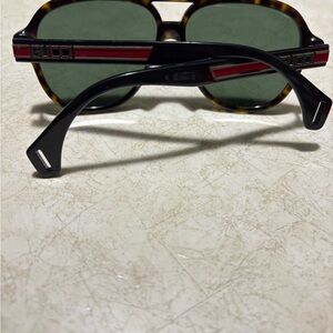 Gucci Tortoise Sunglasses with Green Lenses